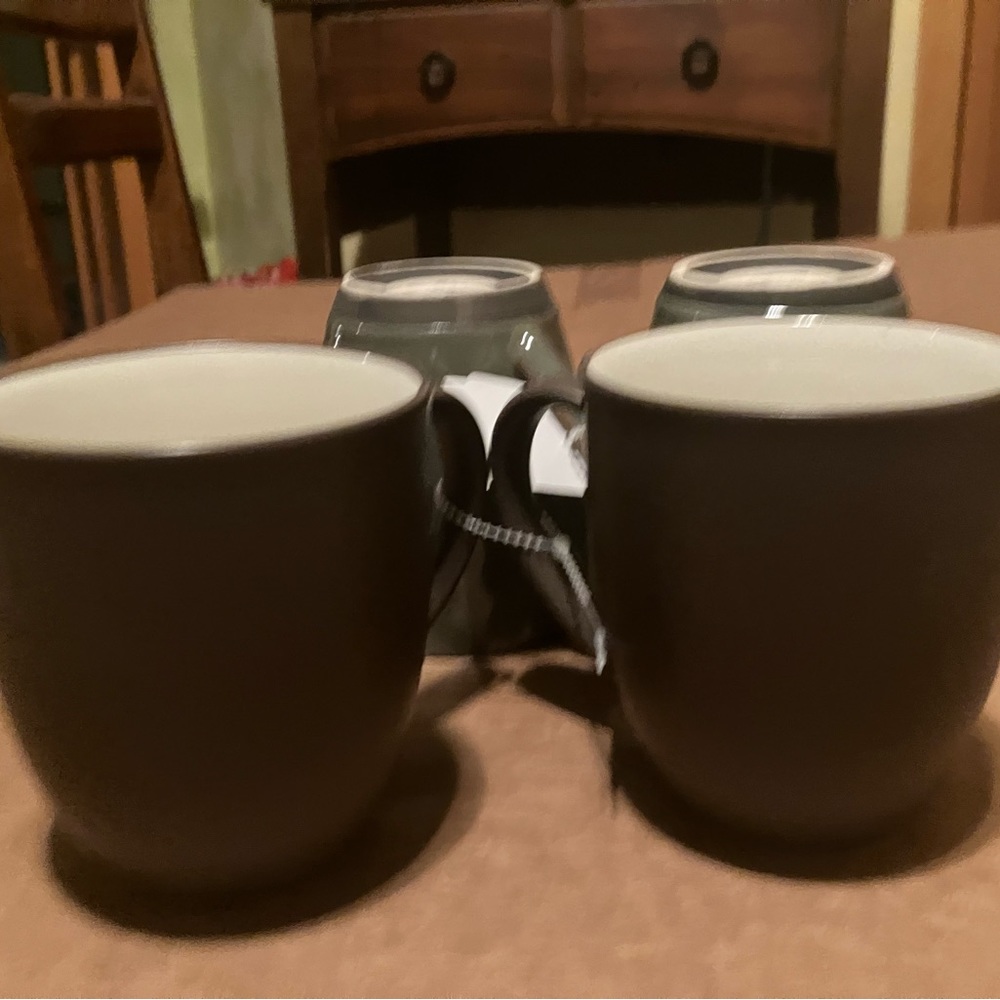 Four coffee cups.